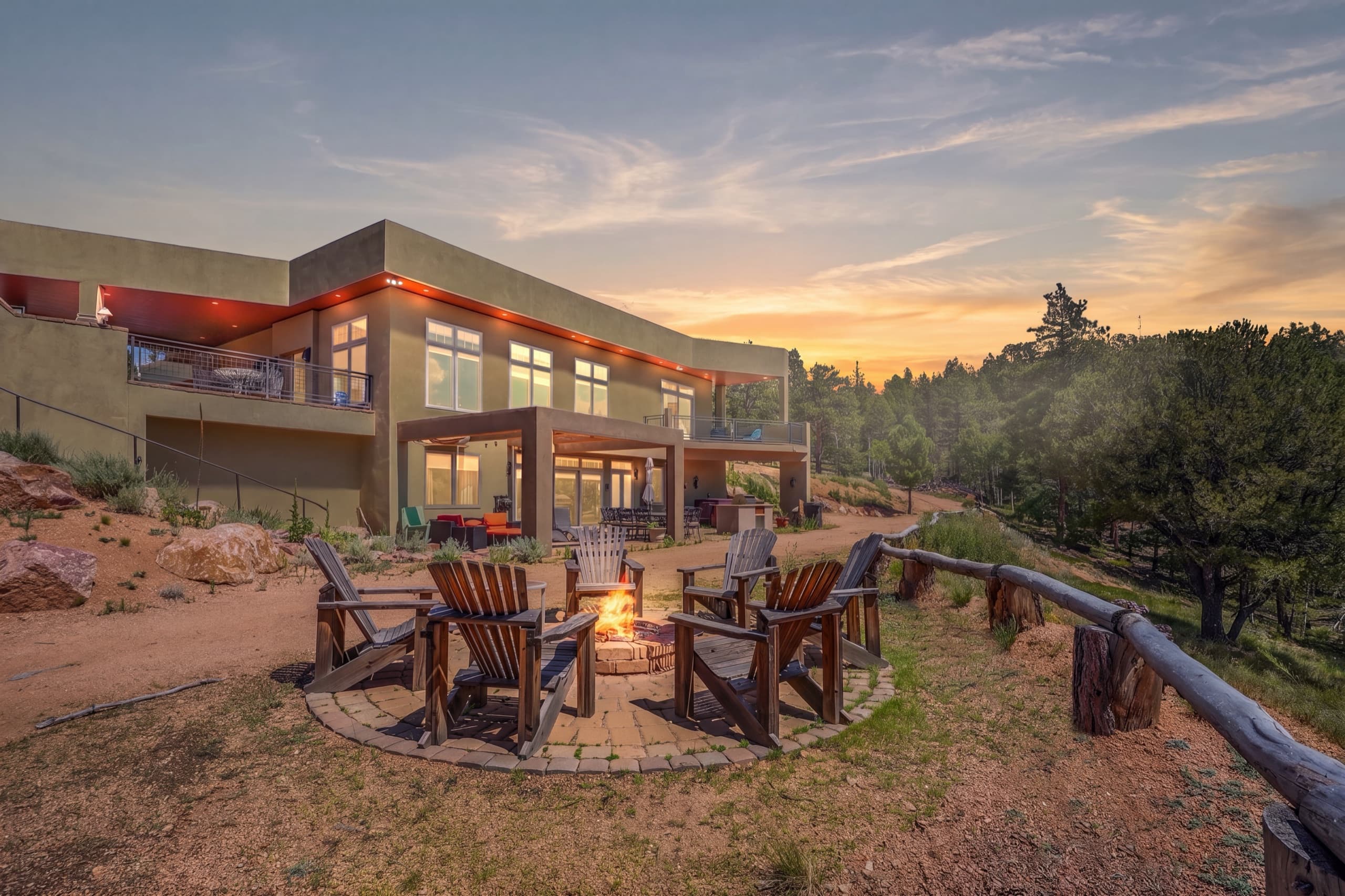 Kutsu Point at golden hour, a ridge-top lodge on forty private acres in the Colorado mountains